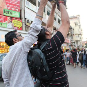 Amaresh and Prakash making a shot of a busy street. (Photo: Annelies Kusters)