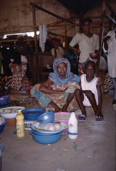 Fulani woman selling milk products (Central Market, Korhogo, Côte d’Ivoire). (Photo: Boris Nieswand)