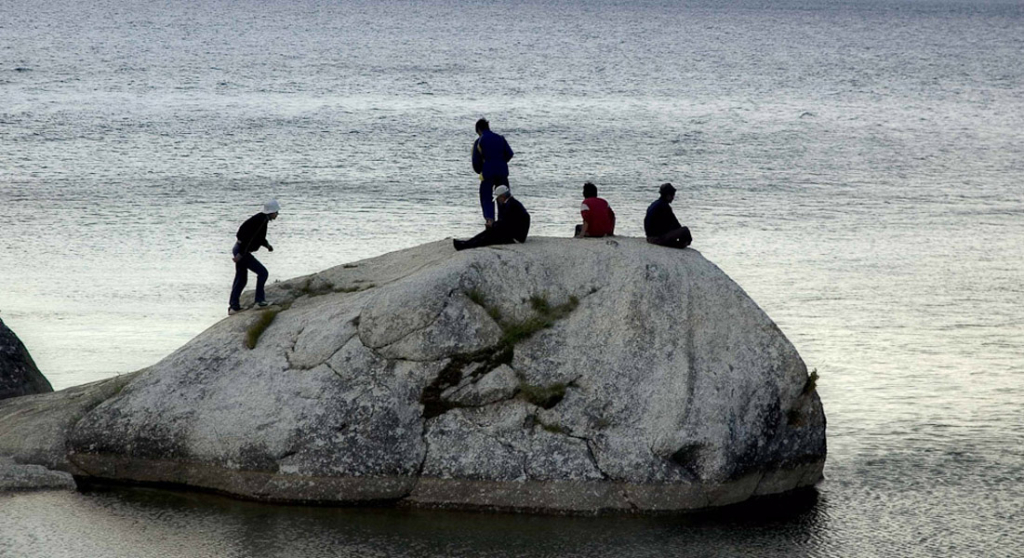 Members of the Shaman’s Organization Tengeri on Shaman’s Rock, Olkhon Island, Lake Baikal. July 2005. (Photo: Justine Buck Quijada)