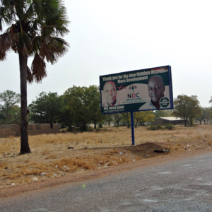 Campaign poster, Nabdam District, Ghana. (Photo: Elena Gadjanova)