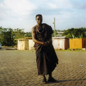 Transnational migrant on his way to a funeral (Dormaa Ahenkro, Ghana). (Photo: Boris Nieswand)