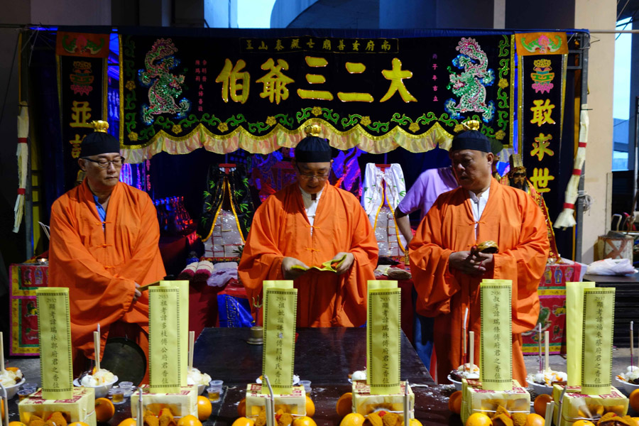 Singapore – Taoist priests performing a pudu ritual for ancestors. (Photo: Fabian Graham)