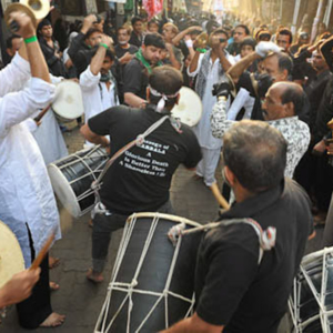 Playing Damam, Jail Rad, Dongri, Mumbai, December 2010 - Damam is a kind of drum from the south of Iran; it is still played by small Iranian diaspora community from the city of Bushehr, a port city in the south of Iran, during Muharram. (Photo: Reza Masoudi Nejad)