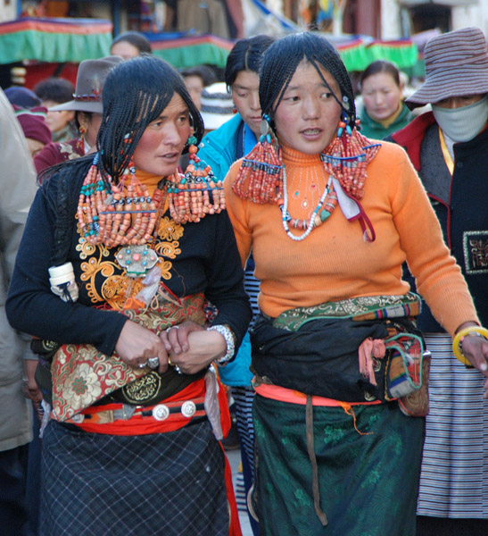 Tibetan women circle the Barkhor in Lhasa, Tibet, China. (Photo: Naomi Hellmann)