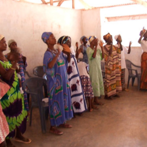 Deaf people signing a song during the church service. (Photo: Annelies Kusters)