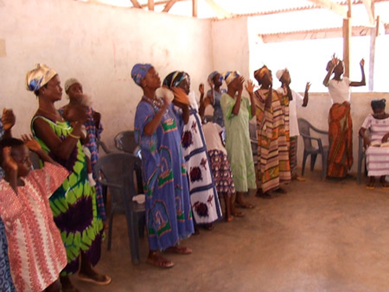 Deaf people signing a song during the church service. (Photo: Annelies Kusters)