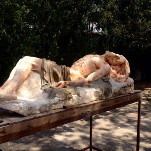 Symbolic displacement of longstanding Catholicism by Buddhism: Baroque ‘Dead Christ Lying’ in the backyard of a Buddhist socio-cultural association/Temple’s new location, Murcia, Spain. (Photo: Damian Omar Martinez)