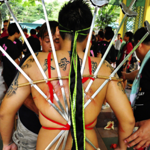 Singapore – Extreme body piercing by a spirit medium channelling the Underworld deity Di Ya Pek. (Photo: Fabian Graham)
